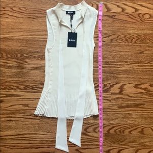 Pleated sleeveless cream top